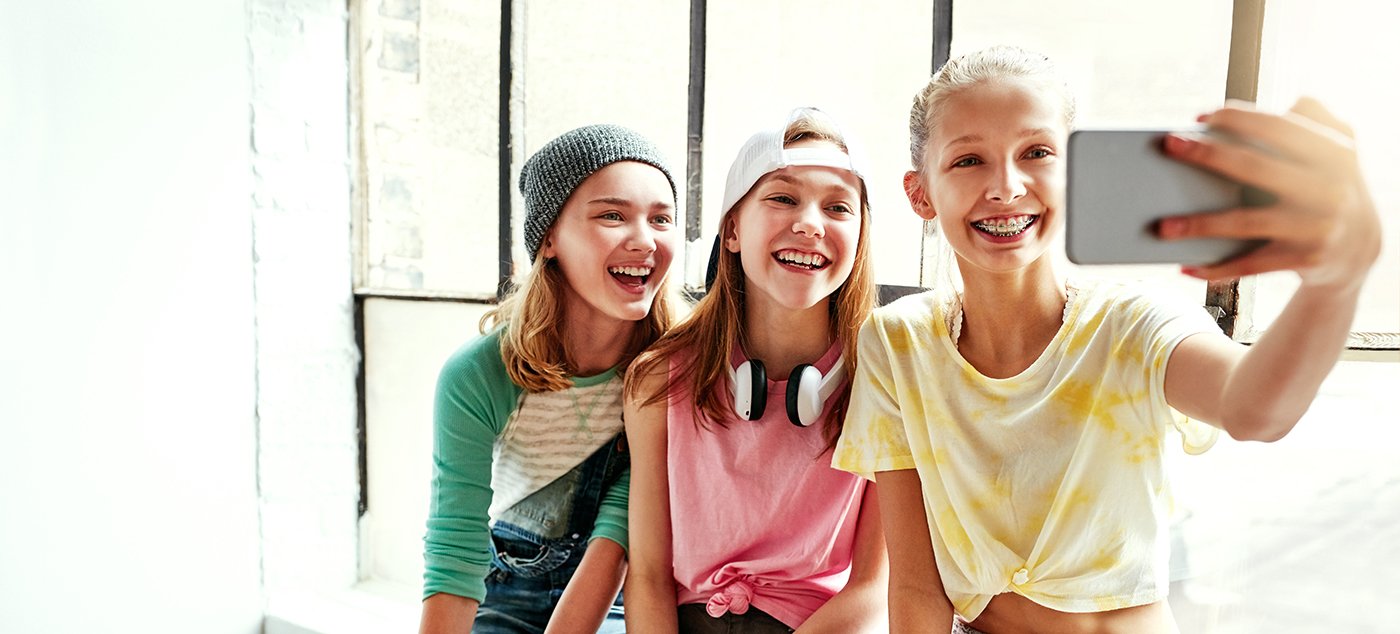 Group of teenage girls taking a selfie